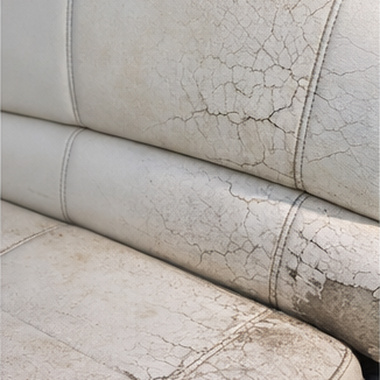 Worn marine seat before repair